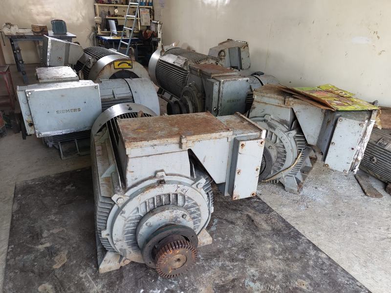 A row of industrial motors in for work at the Loni workshop