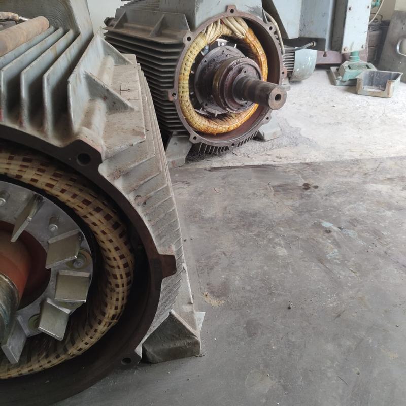 An opened motor with its stator winding exposed, at the Chani Electricals workshop