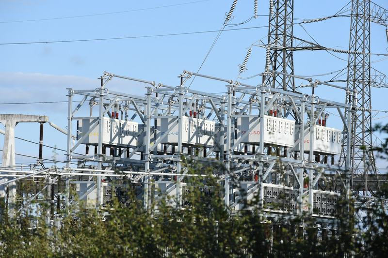 Transformers and overhead conductors at an outdoor electrical substation